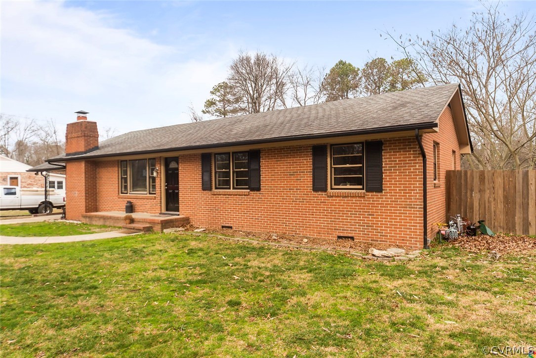 4210 Treely Road Chester, VA 23831 - Photo 4 of 39 a front view of house with yard and trees around