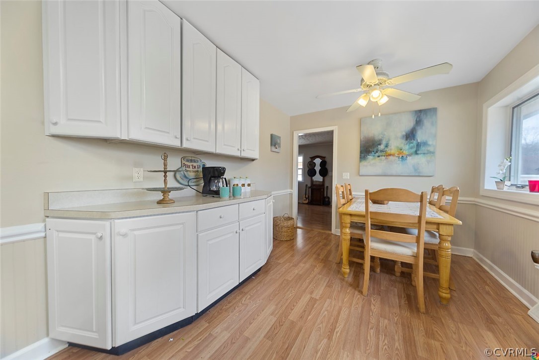 4210 Treely Road Chester, VA 23831 - Photo 10 of 39 a kitchen with a cabinets and chairs