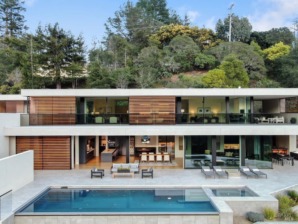 a view of house with outdoor sitting space