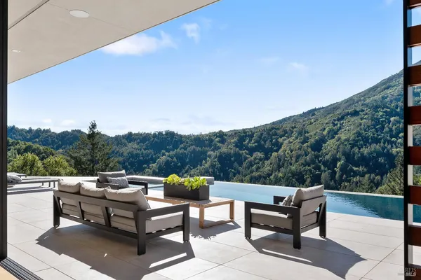 a view of a terrace with couches and a table