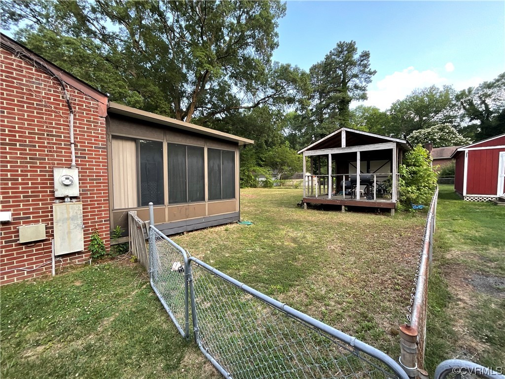 2737 Sherbourne Road Richmond, VA 23237 - Photo 2 of 3 a view of a house with backyard and porch