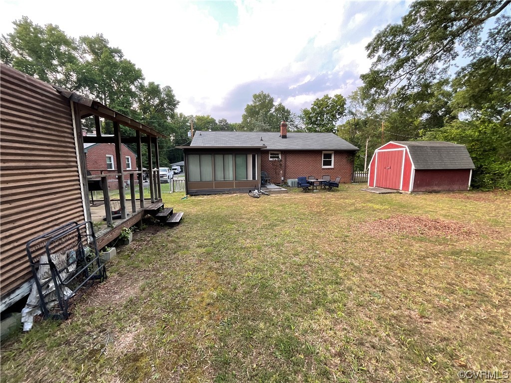 2737 Sherbourne Road Richmond, VA 23237 - Photo 3 of 3 a view of a house with a yard