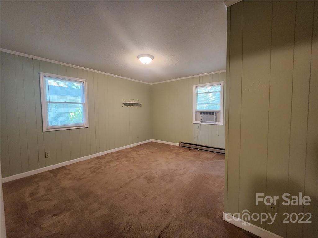 291 Cherokee Way Marion, NC 28752 - Photo 13 of 14 an empty room with a window