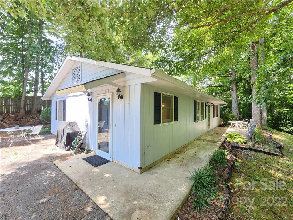 291 Cherokee Way Marion, NC 28752 - Photo 2 of 14 a view of a house with backyard and sitting area