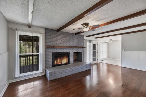 a bathroom with a sink double vanity and a toilet