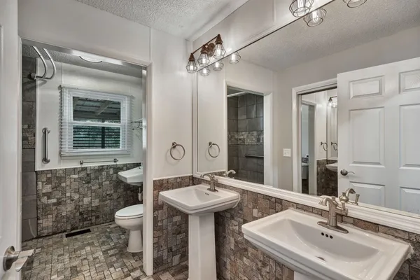 an empty room with a empty space and windows