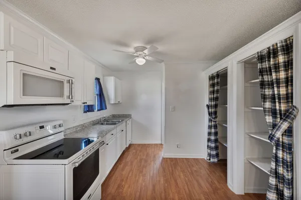 a view of a lake with a houses