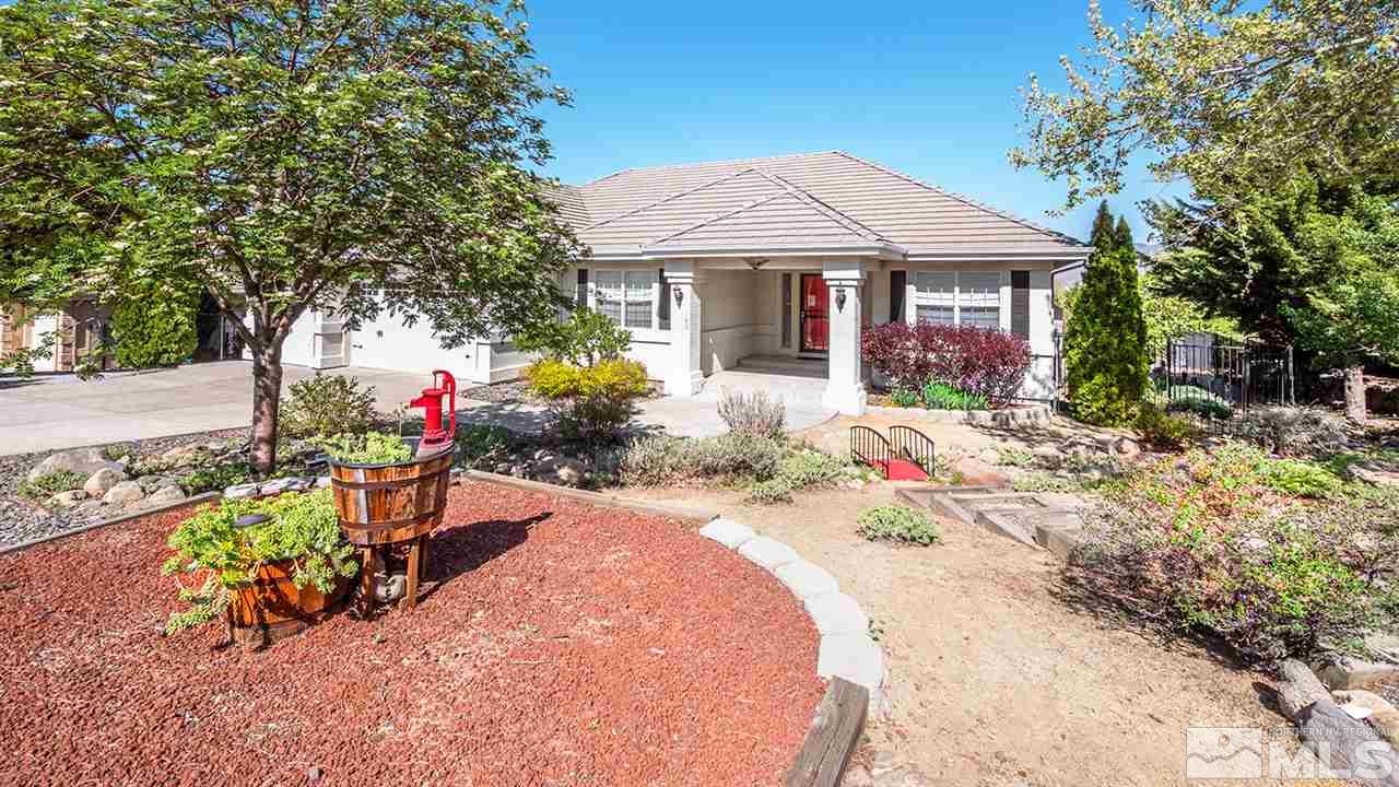 140 Gazelle Road Reno, NV 89511 - Photo 1 of 26 front view of a house with a yard