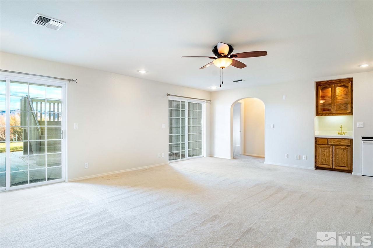140 Gazelle Road Reno, NV 89511 - Photo 18 of 26 a view of a livingroom with a ceiling fan and window