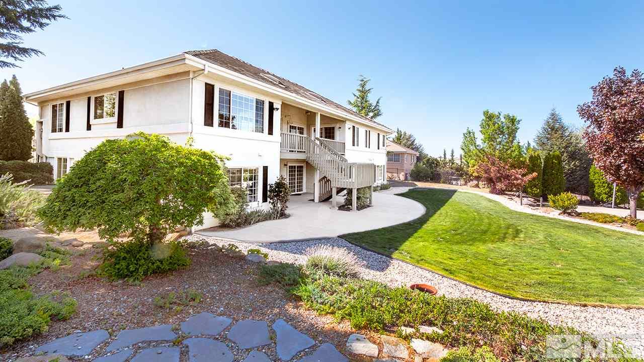 140 Gazelle Road Reno, NV 89511 - Photo 20 of 26 a front view of a house with a yard