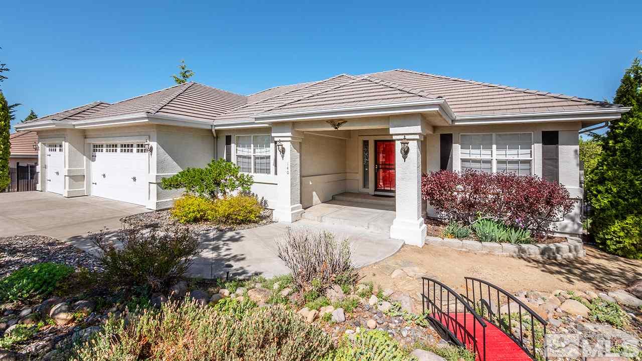 140 Gazelle Road Reno, NV 89511 - Photo 2 of 26 a front view of a house with a yard