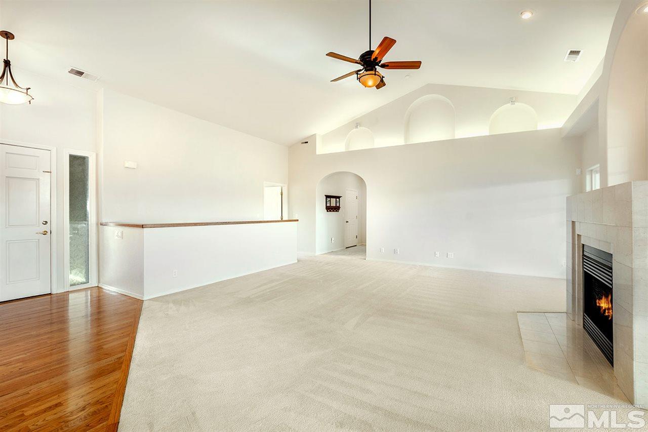 140 Gazelle Road Reno, NV 89511 - Photo 9 of 26 a view of a hallway with a fireplace