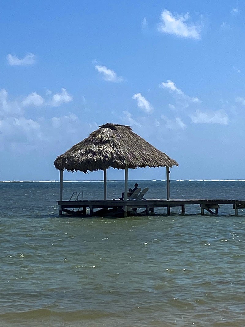 0 Sapphire Beach, Unit 17C2 Robstown, TX 78380 - Photo 12 of 12 a blue bench sitting in the middle of a field