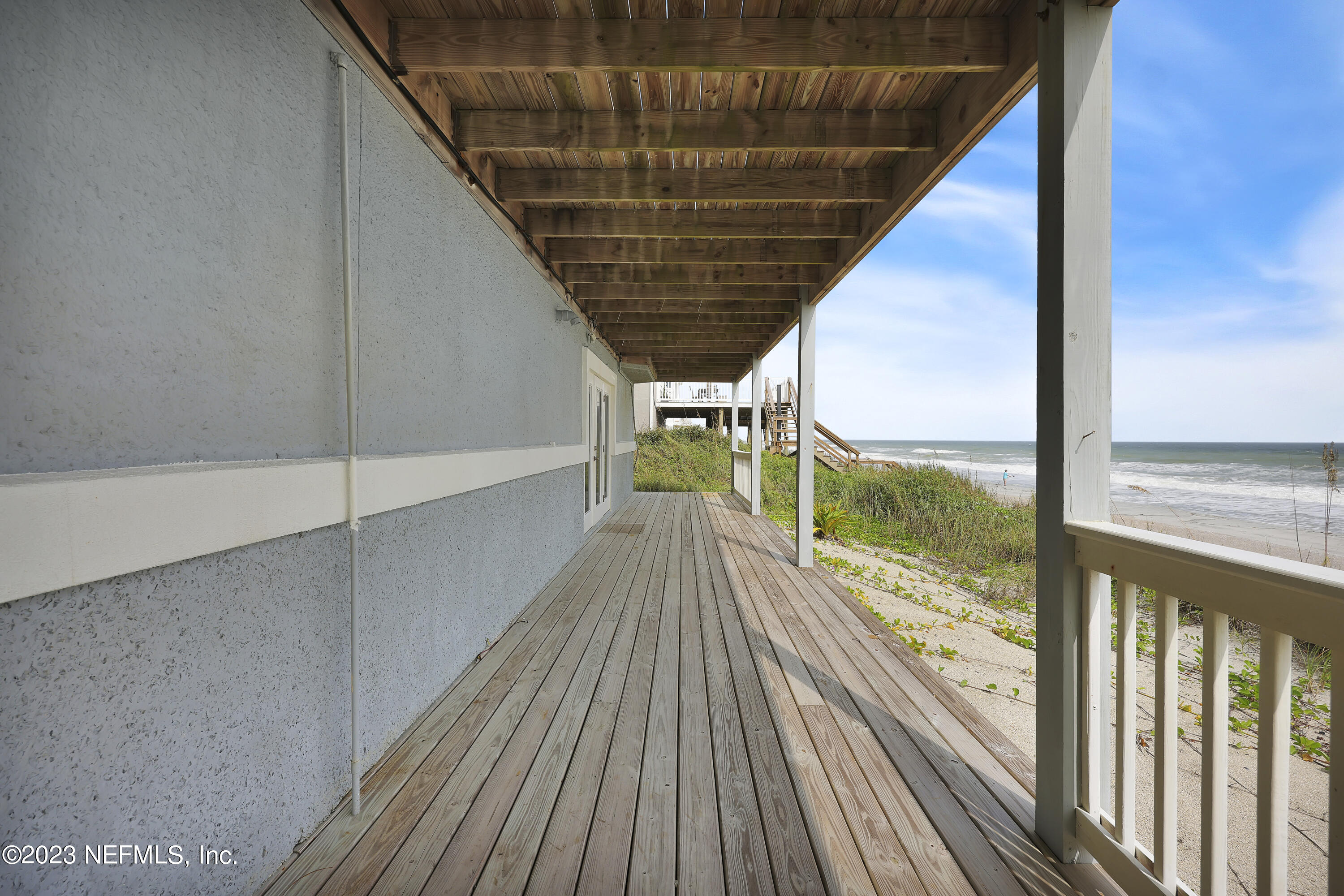 4582 Coastal Highway St. Augustine, FL 32084 - Photo 42 of 45 a view of balcony with wooden floor