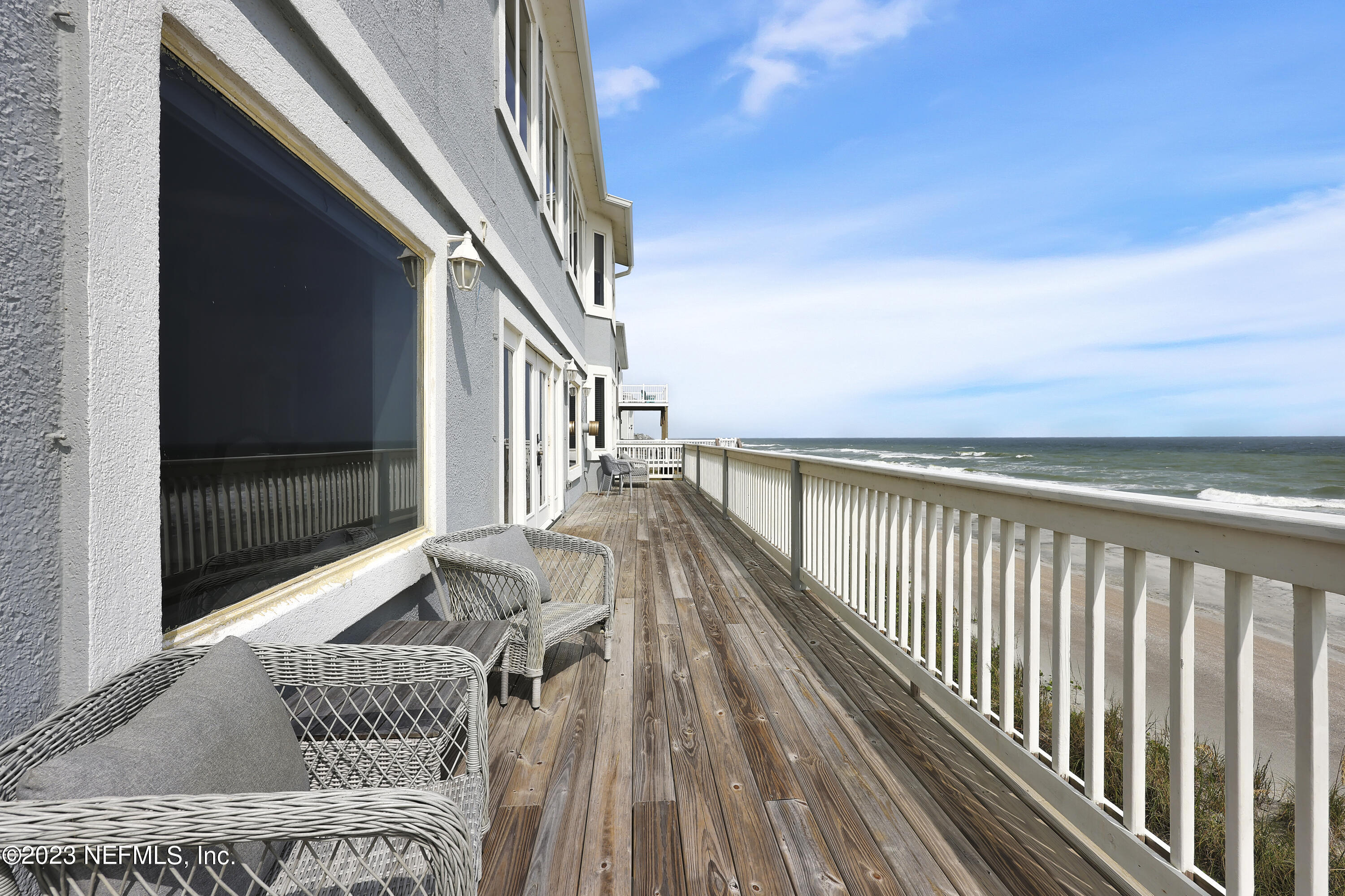 4582 Coastal Highway St. Augustine, FL 32084 - Photo 44 of 45 a view of balcony with wooden floor and fence