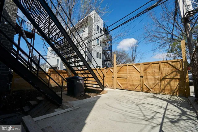 a view of a backyard of the house