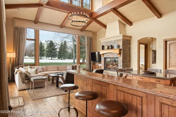 a very nice looking living room with a large window