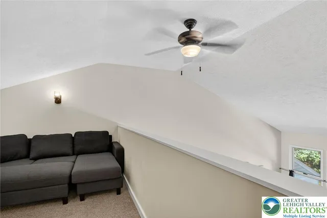 a view of balcony with furniture