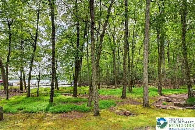 a view of a street with benches in the background