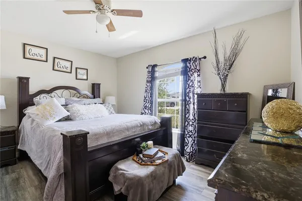 a bedroom with a bed and closet