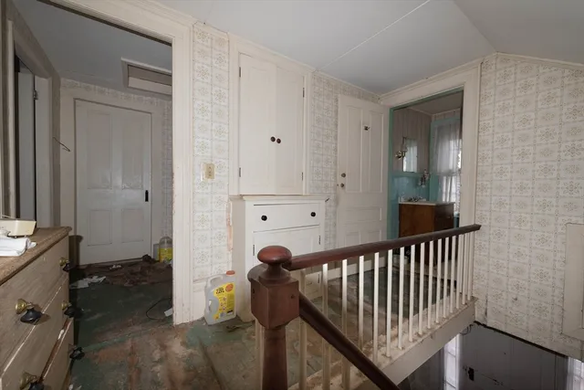 a bathroom with a sink and a window
