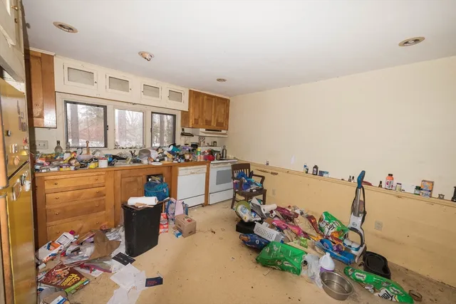 a very nice looking room with a dining table and a chandelier