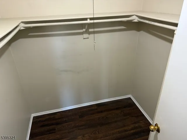 a view of room with racks on the wall