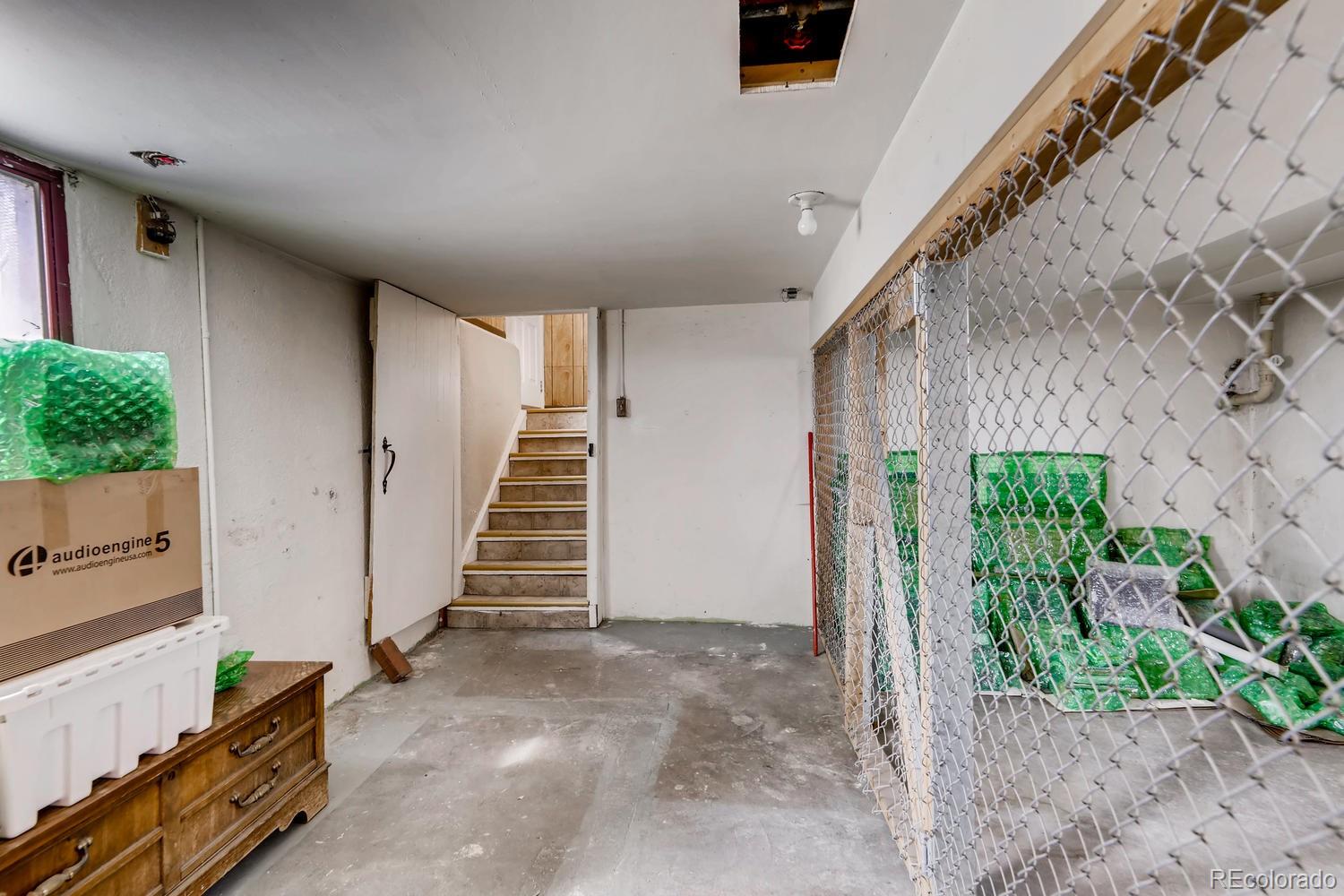 4445 Perry Street Denver, CO 80212 - Photo 13 of 19 a view of entryway with stairs