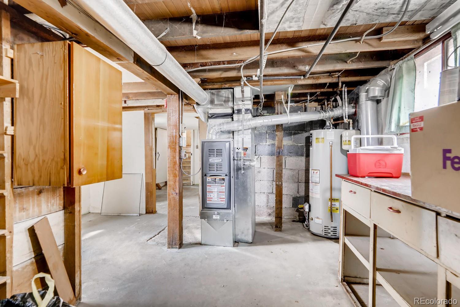 4445 Perry Street Denver, CO 80212 - Photo 14 of 19 a view of storage and utility room