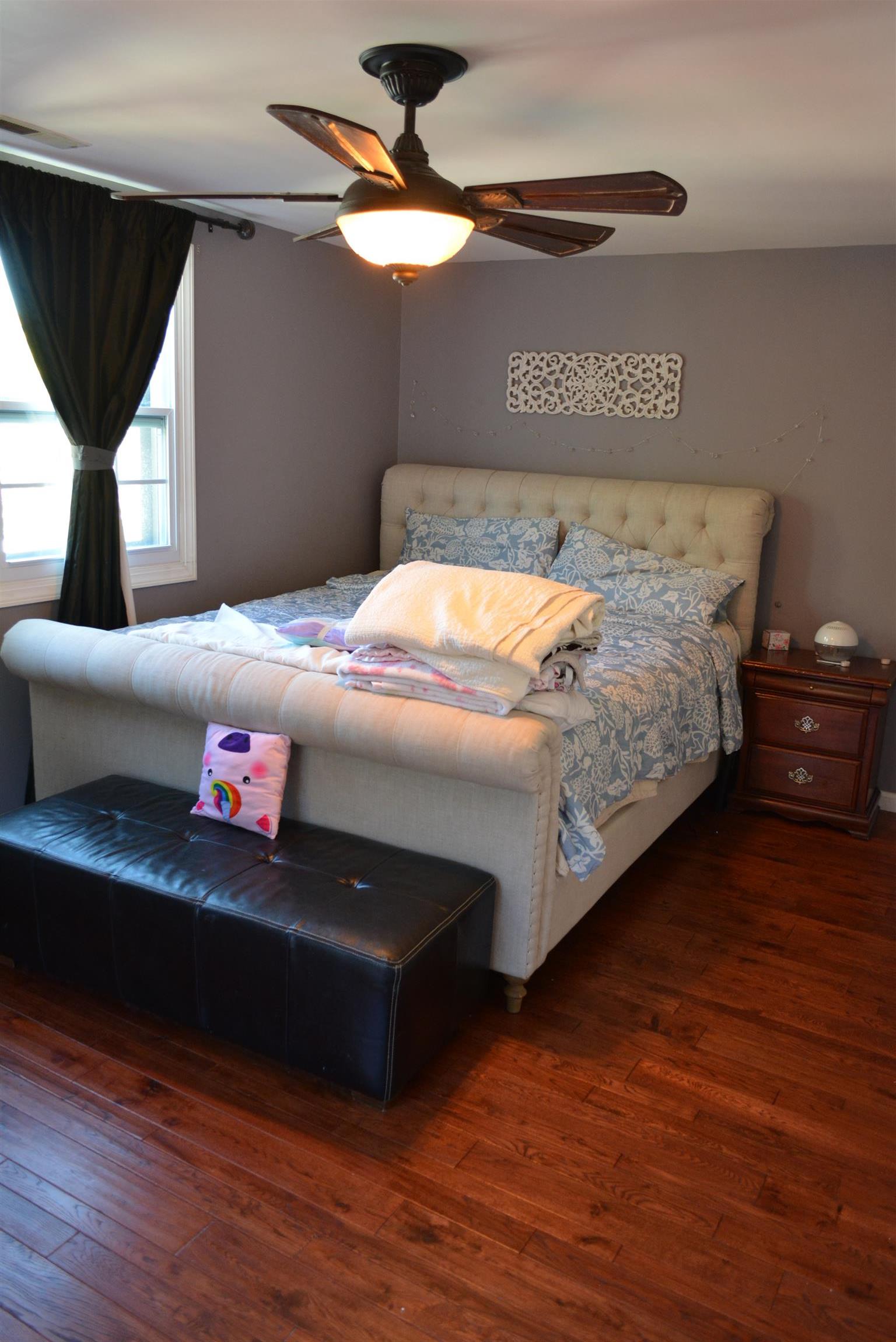 543 Rural Hill Road Nashville, TN 37217 - Photo 13 of 29 Spacious master bedroom with a full bath and walkout back deck.