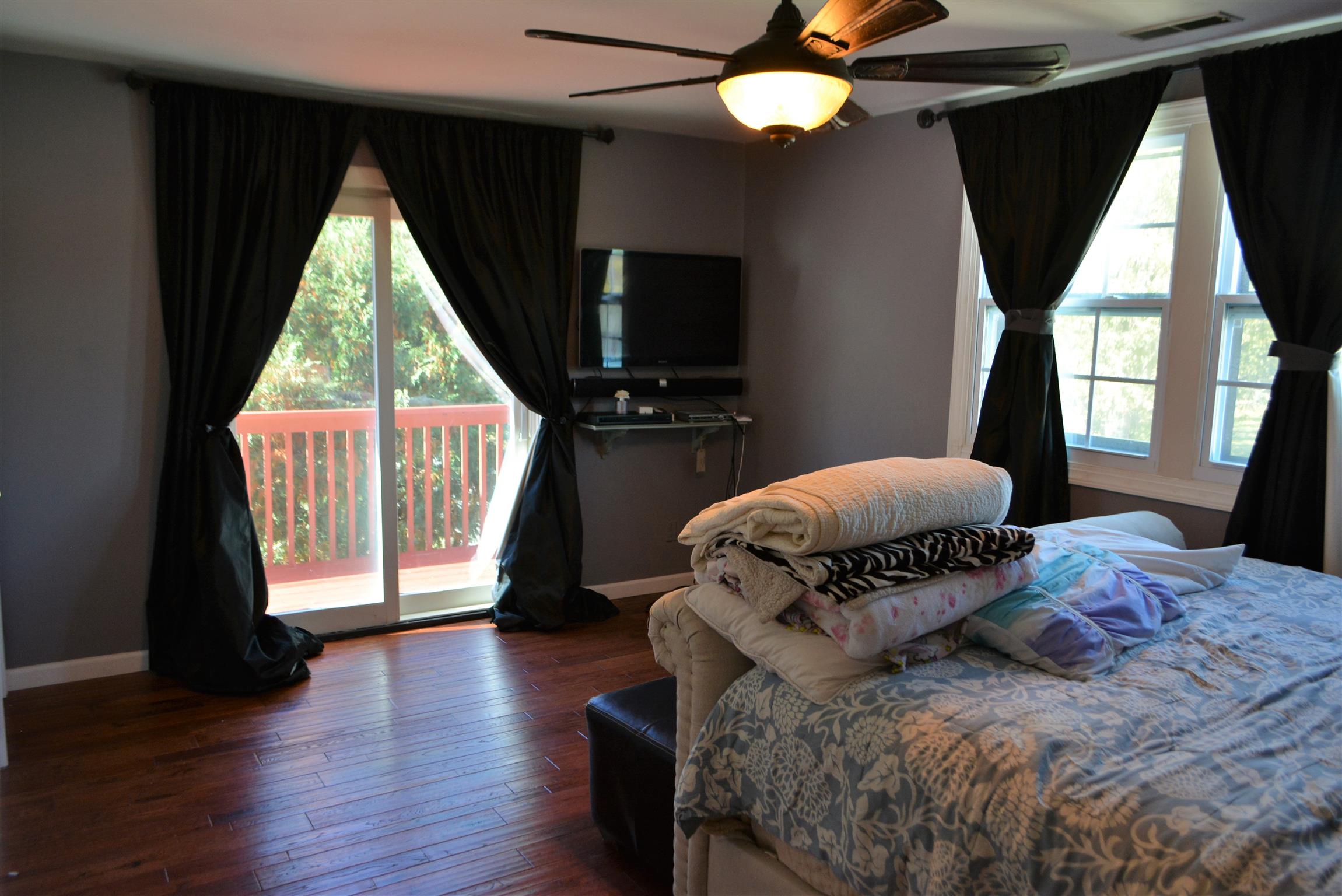 543 Rural Hill Road Nashville, TN 37217 - Photo 14 of 29 Spacious master bedroom with a full bath and walkout back deck.