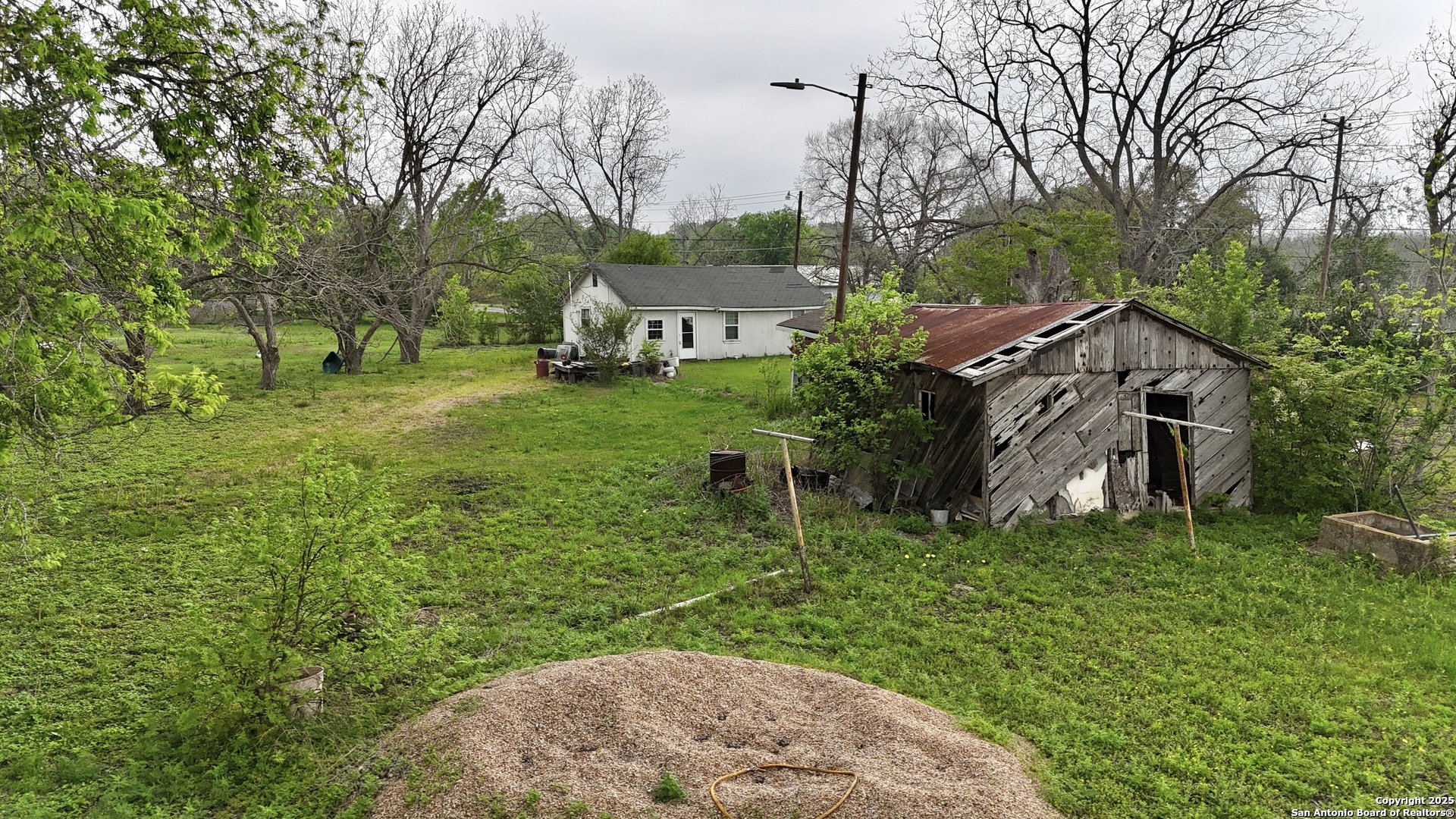 2197 Fm 1984 Maxwell, TX 78656 - Photo 8 of 9 a view of a house with a yard