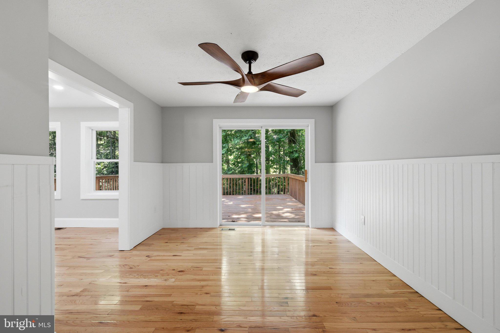 461 Norman Road High View, WV 26808 - Photo 18 of 73 Dining area has beautiful wainscotting and big fan