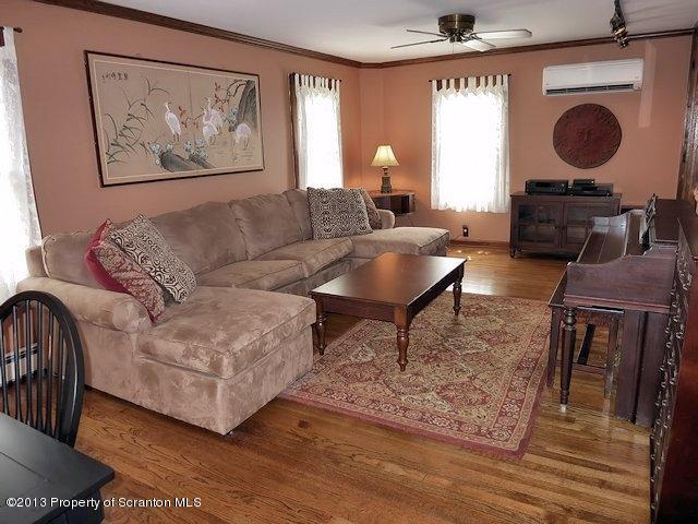 3441 Madisonville Road Moscow, PA 18444 - Photo 13 of 28 a living room with furniture and a fireplace