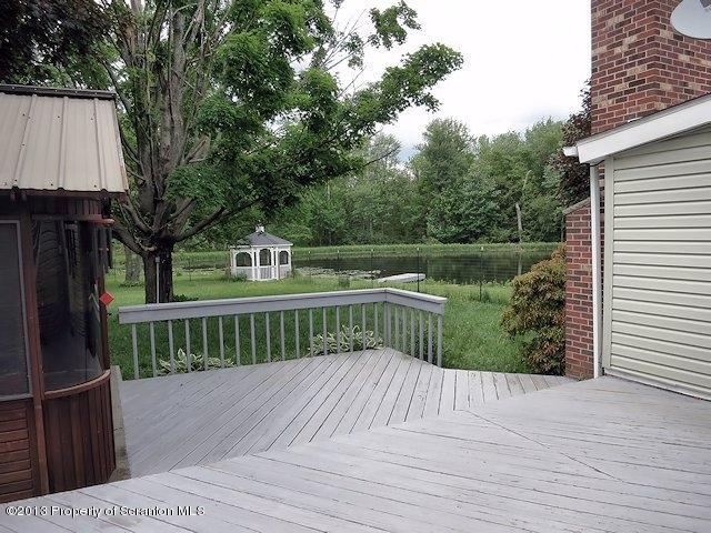 3441 Madisonville Road Moscow, PA 18444 - Photo 21 of 28 a view of a wooden deck