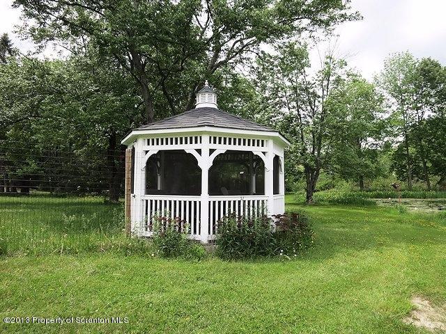 3441 Madisonville Road Moscow, PA 18444 - Photo 24 of 28 a front view of a house with garden