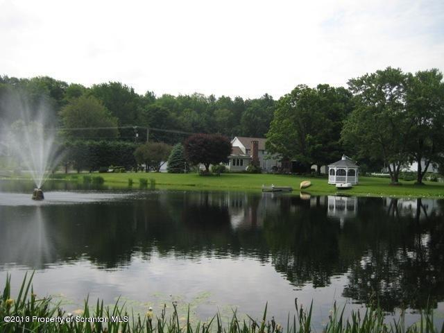 3441 Madisonville Road Moscow, PA 18444 - Photo 26 of 28 a view of lake with green space