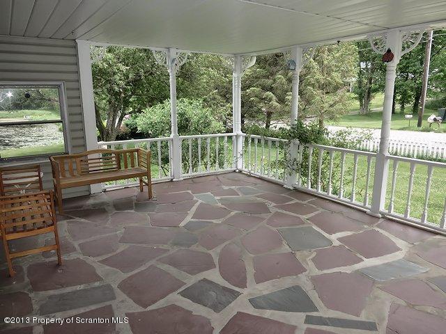 3441 Madisonville Road Moscow, PA 18444 - Photo 7 of 28 a view of a room with wooden floor and windows