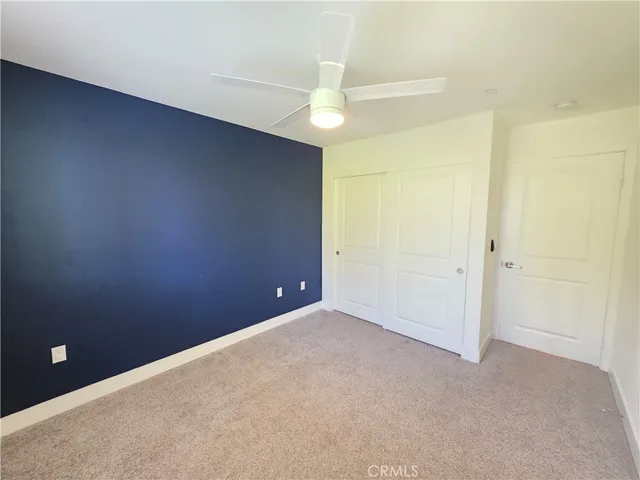 an empty room with a bathroom