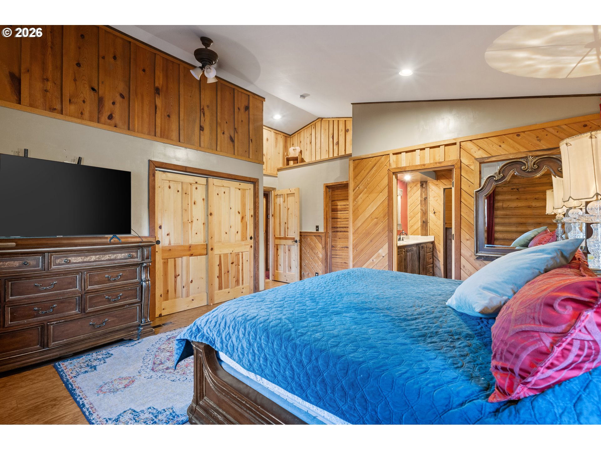 74091 Thornhollow Road Adams, OR 97810 - Photo 23 of 48 a bedroom with a bed and flat screen tv
