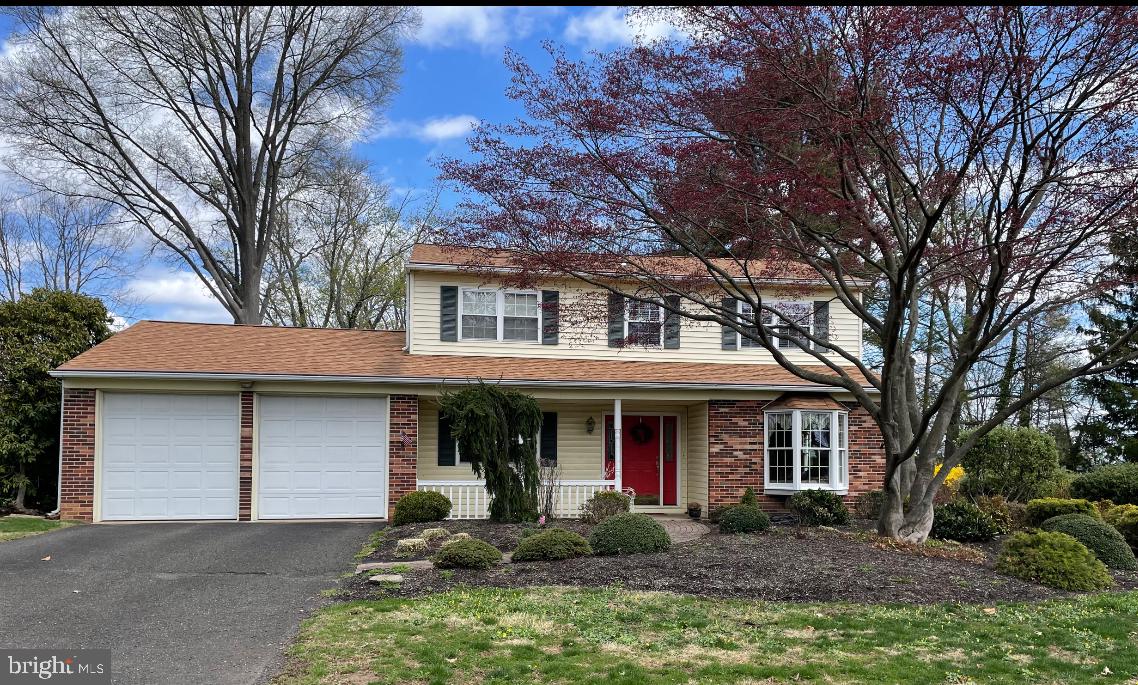2535 Exton Road Hatboro, PA 19040 - Photo 1 of 19 a front view of a house with garden and trees
