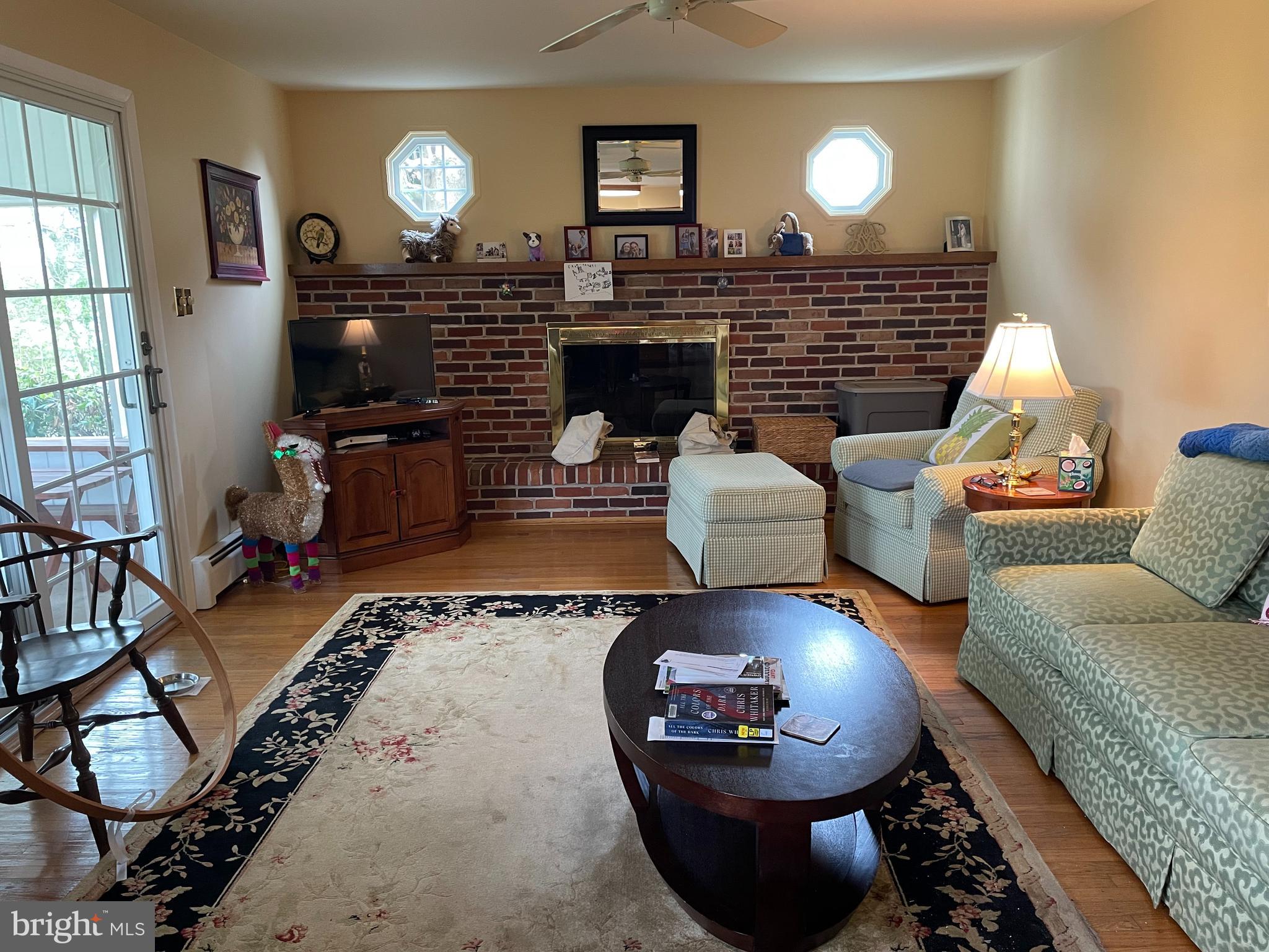 2535 Exton Road Hatboro, PA 19040 - Photo 3 of 19 a living room with furniture and a fireplace