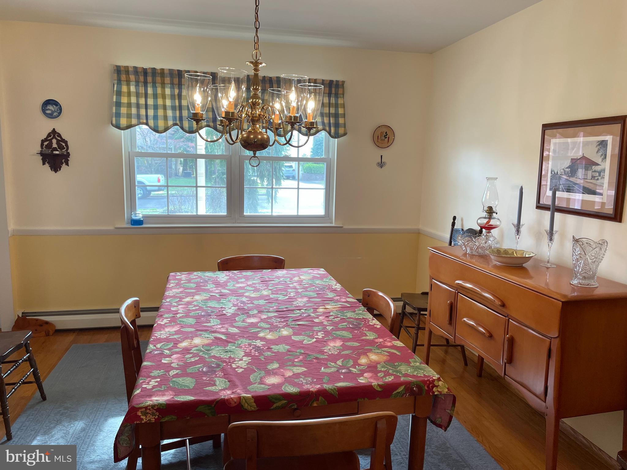 2535 Exton Road Hatboro, PA 19040 - Photo 6 of 19 a bedroom with a bed and a chandelier