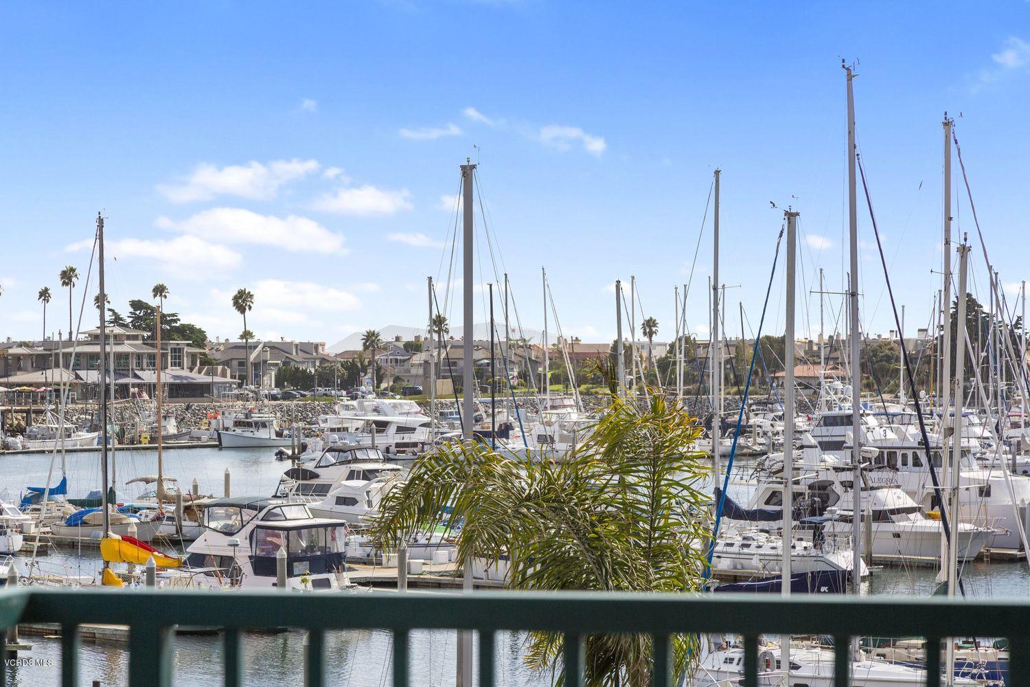 3101 Peninsula Road, Unit 211 Oxnard, CA 93035 - Photo 1 of 48 a view of a lake with boats