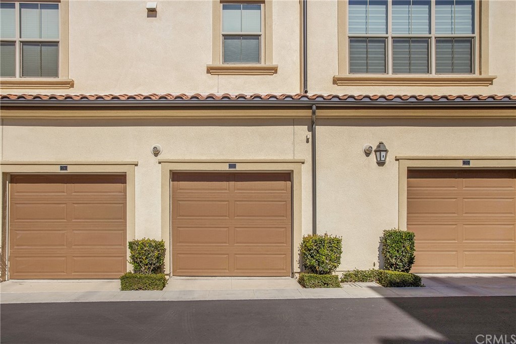 72 Capricorn Irvine, CA 92618 - Photo 21 of 24 front view of a house with a window and a gate