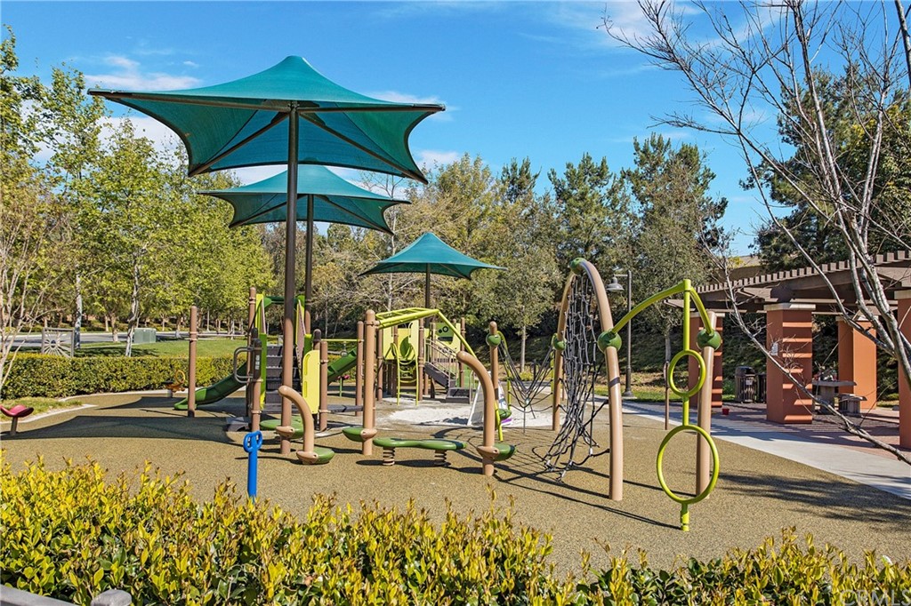 72 Capricorn Irvine, CA 92618 - Photo 24 of 24 a view of a swimming pool with sitting area