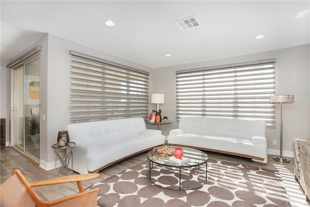 72 Capricorn Irvine, CA 92618 - Photo 5 of 24 a bathroom with a bathtub and next to a window