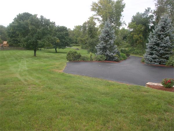 9 Garvey Road Framingham, MA 01701 - Photo 29 of 30 a view of a green field with trees