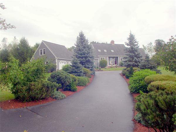 9 Garvey Road Framingham, MA 01701 - Photo 4 of 30 an aerial view of a house with a yard and garden