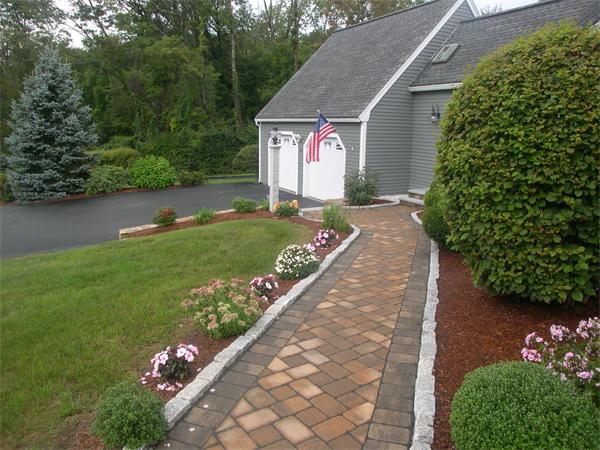 9 Garvey Road Framingham, MA 01701 - Photo 6 of 30 a view of a back yard of the house